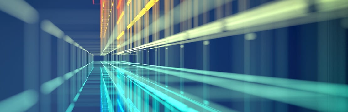 Abstract digital data corridor with teal and yellow light streaks, representing the S&P 500’s shift toward technology-driven, asset-light businesses and the growing influence of AI-related sectors on market resilience.